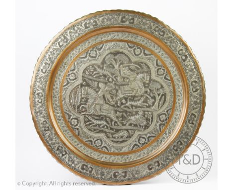 A 20th century Indian Bidriware style charger, the circular charger depicting a central hunting scene amidst floral sprays, 4