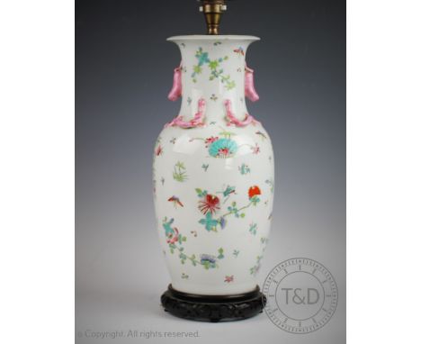 A Chinese famille rose lamp base, decorated with flowers and insects, 39cm high (chip to rim) CONDITION REPORT: Lighting lots