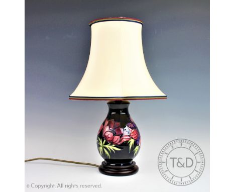 A Moorcroft Anemone pattern lamp, on fitted wood base, with shade, 44cm overall CONDITION REPORT: Lighting lots are sold as d