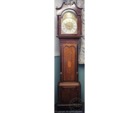 A George III and later inlaid oak eight day longcase clock, with silvered Roman numeral chapter ring and engraved centre with