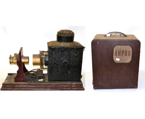 A Large Tinplate Magic Lantern, on mahogany base (a/f), together with a collection of lantern slides and an Ampro projector (