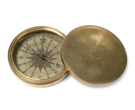 19th Century Compass with paper label in case and inside lid, in brass case with screw on lid