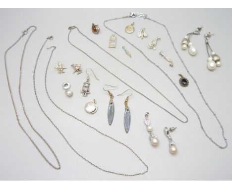 A collection of silver and plated jewellery including a silver Georg Jensen pendant, a silver locket, plated earrings, white 