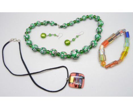 A millefiore glass bead necklace, a bracelet, a pair of earrings, and a Murano style glass pendant