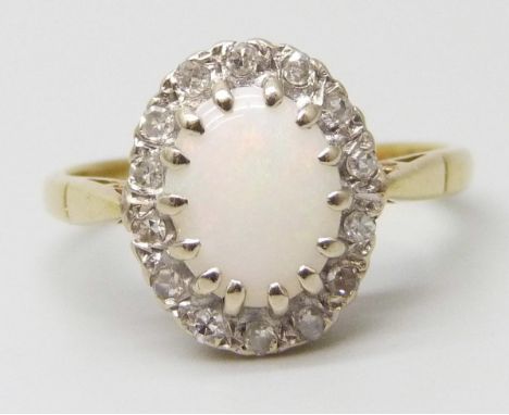 A yellow metal, opal and diamond cluster ring, hallmarks worn, 3.9g, N