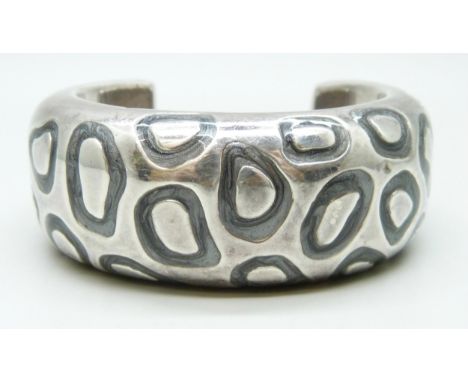 A 925 silver covered bangle with enamel detail, possibly Simon Sebbag, 54.5g total weight