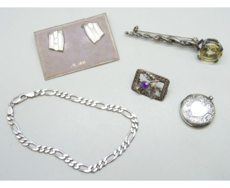 A collection of silver jewellery including a pair of Albert Schaning Norwegian silver and enamel earrings, a kilt pin brooch 