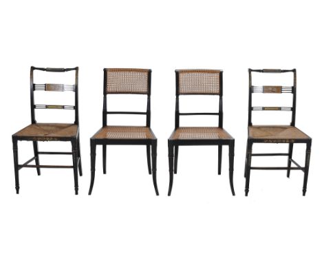  A pair of George III ebonised and polychrome painted chairs,   circa 1800, each rectangular overscrolling back with twin pie
