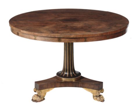  A Regency rosewood, parcel gilt and brass inlaid centre table,   circa 1810, in the manner of Marsh and Tatham, after Henry 