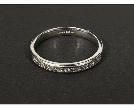 A hallmarked platinum 1/2 eternity ring set with 9 diamonds, 5gm, size N-O 