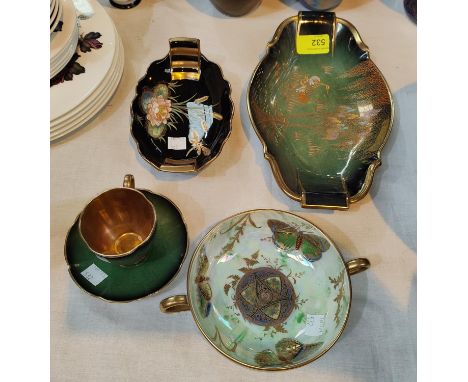 Two Carltonware lustre bowls decorated in gilt and enamel with trees and flowers; a cup and saucer; a similar 2 handled bowl 