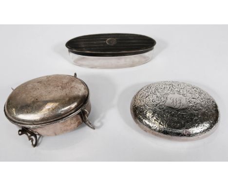 A hallmarked silver oval snuff box with spring loaded top, chased and monogrammed, Sheffield 1906; a hallmarked silver oval t