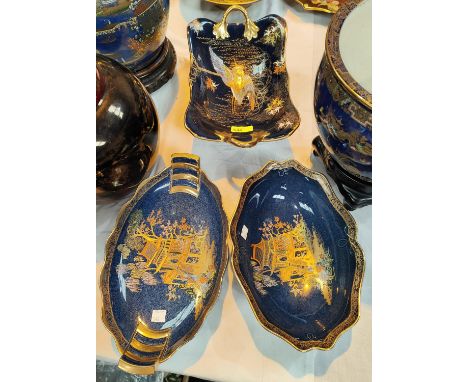 A Carltonware rectangular shallow dish on raised foot, decorated with an exotic bird on blue ground, length 31cm; 2 oval dish