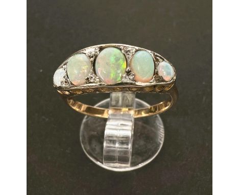 A 9ct gold dress ring, set with 5 graduating oval opals, largest length approx. 6cm, size N, 3.27gm 