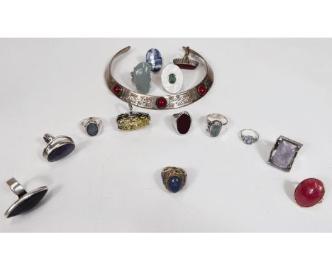 A dress ring set oval lapis lazuli, the surround and shoulders with Celtic knot and enamel decoration, on expandable shank, s