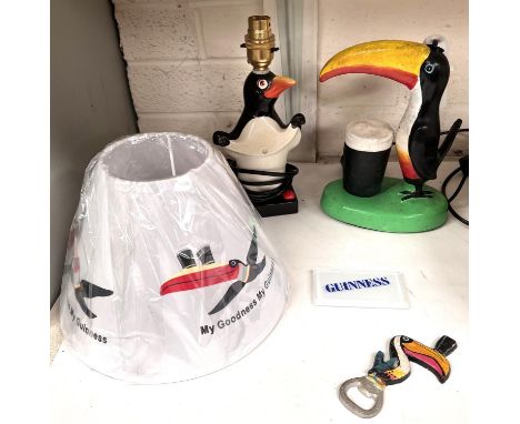 A Carlton ware Guinness penguin lamp, another similar Toucan Carlton ware style lamp, etc  The penguin lamp has a small chip 