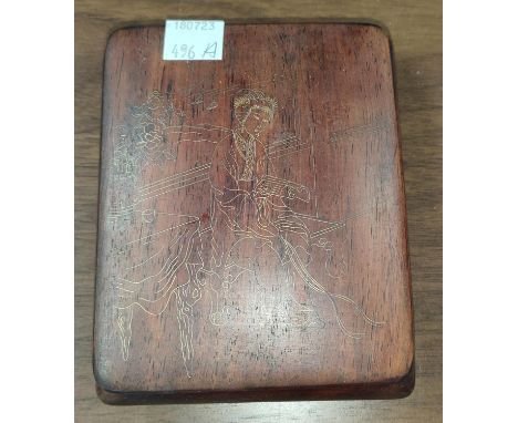 A Chinese wooden writing box in dark wood with gilt inlaid metal decoration of lady sat reading a scroll, 12x10cm 