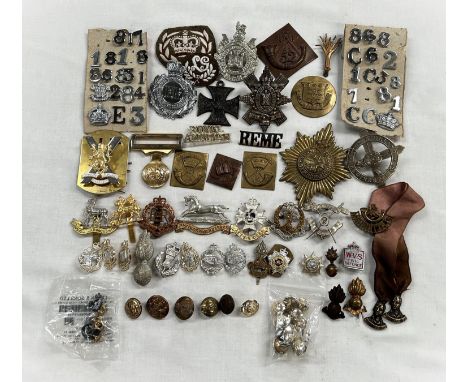 A selection of military badges and buttons including King's Borders Own Scottish Regiment, Lancers, WVS, Army Ordinance etc 
