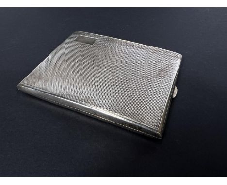 An engine turned cigarette case Birmingham 1933 and 2 hallmarked gold napkin rings 4.5oz 