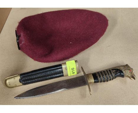 A WWII period Italian Fascist youth knife with brass eagle head, wooden handle leather scabbard; a reproduction Paratrooper b