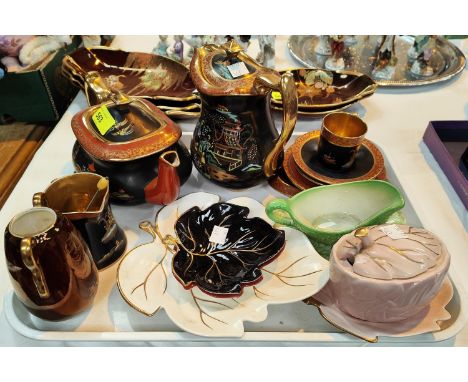 A Carltonware unusual part tea set with chinoiserie decoration on black ground, 8 pieces; Carlton leaf dishes; etc. 