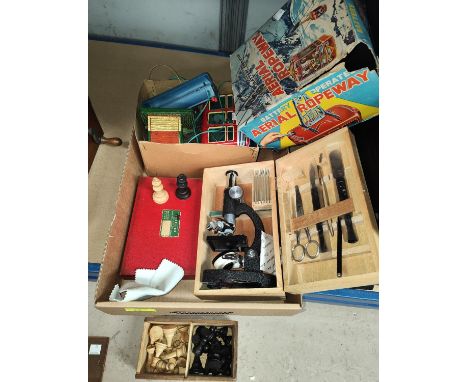 A 1960's tinplate "Arial Ropeway"; a student microscope; chess sets 