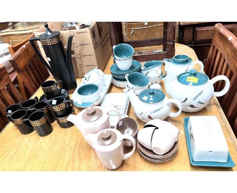 A Denby Greenwheat part tea set; a 1950's Poole part coffee set; a Portmeirion 15 piece coffee set, Greek key pattern 