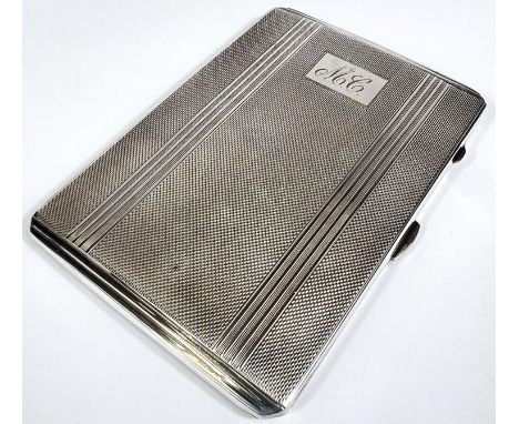 An engine turned hallmarked silver cigarette case, inscribed Birmingham 1955 6oz 