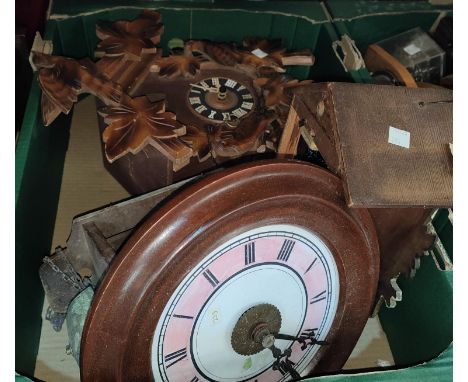 A 19th century circular dial "Postman's Alarm" wall clock; 2 Black Forest Cuckoo clocks&nbsp; 