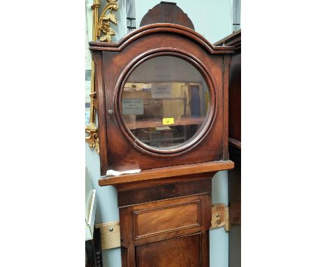 A late 18th century figured mahogany long case clock case with arch top hood and circular glass door, with full length door t