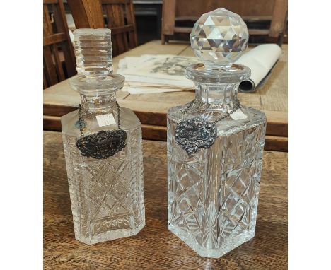 A Waterford 'Strawberry Square' decanter with a silver label and another Royal Brierly decanter