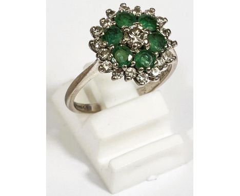 An 18carat hallmarked gold 3 tier dress ring with diamonds and emeralds in flowerhead setting, size N, 4.6gm 