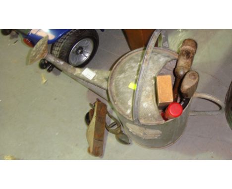 Galvanised watering can, bill hook and other tools