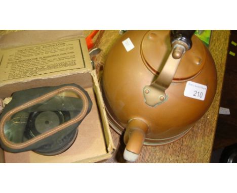 Vintage copper kettle, vintage gas mask and ammunition box