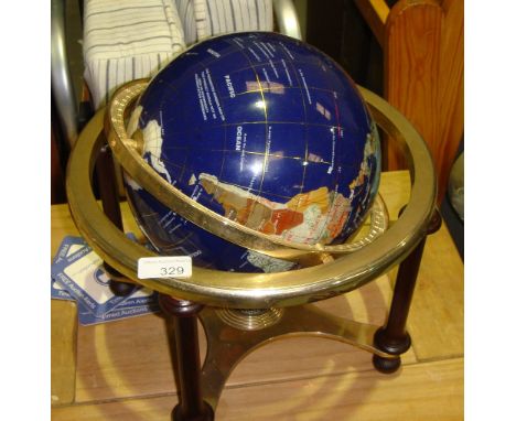 Modern globe inset with semi precious stones