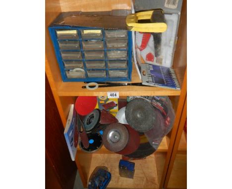 Three shelves of tools etc/. 