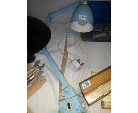 An industrial adjustable bench lamp. 