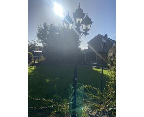 A garden lamp. 7ft 6 inch high.
