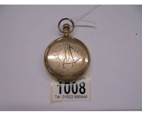 A gold plated monogrammed full hunter pocket watch. 