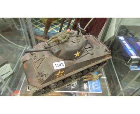 A Tamiya 1/16 scale Sherman tank no controller.