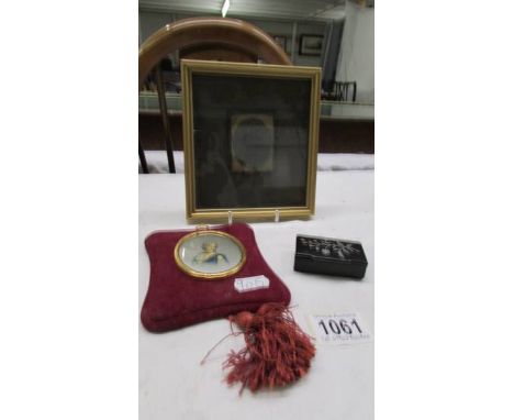 A Victorian velvet framed miniature portrait, one other and a snuff box. 