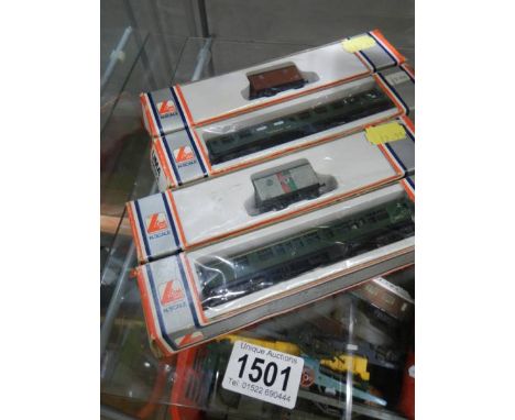 Four boxed Lima 'N' scale - two coaches and two goods wagons.