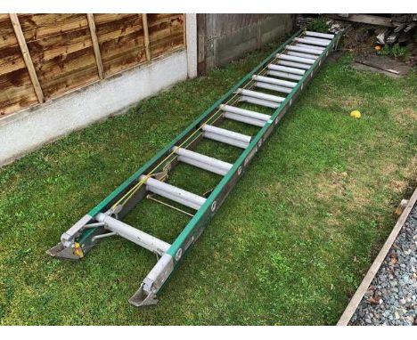A heavy duty industrial double ladder with fibreglass strings, alloy runs.