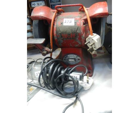A flexible lamp and a Bench grinder. 