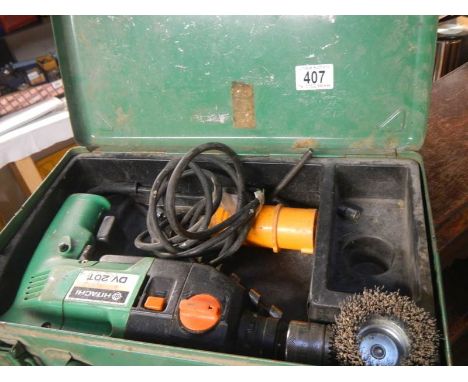 A cased Hitachi drill. 