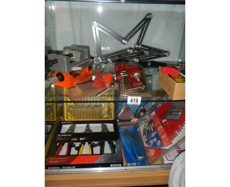 Two shelves of tools. 