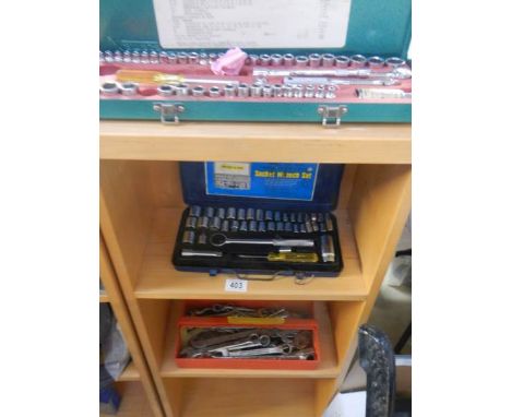 A shelf of garage tools. 