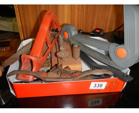A tray of old tools. 