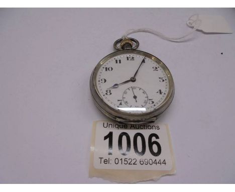 A silver pocket watch. 