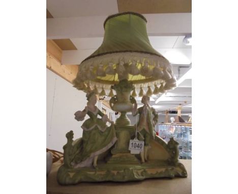 An early 20th century bisque figural table lamp, a/f. 